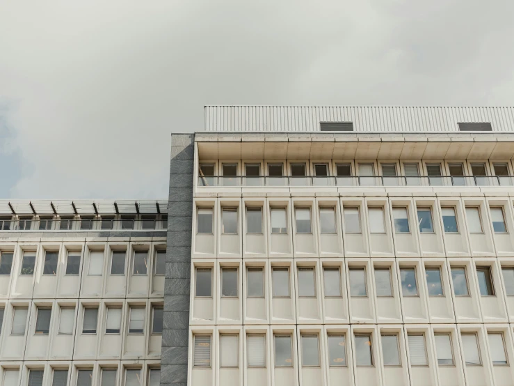 the bottom floors of this building are made of glass