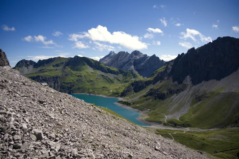 a view of a lake and mountains during the day