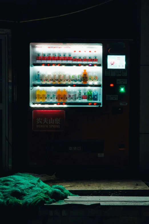 a vending machine with glowing lights inside