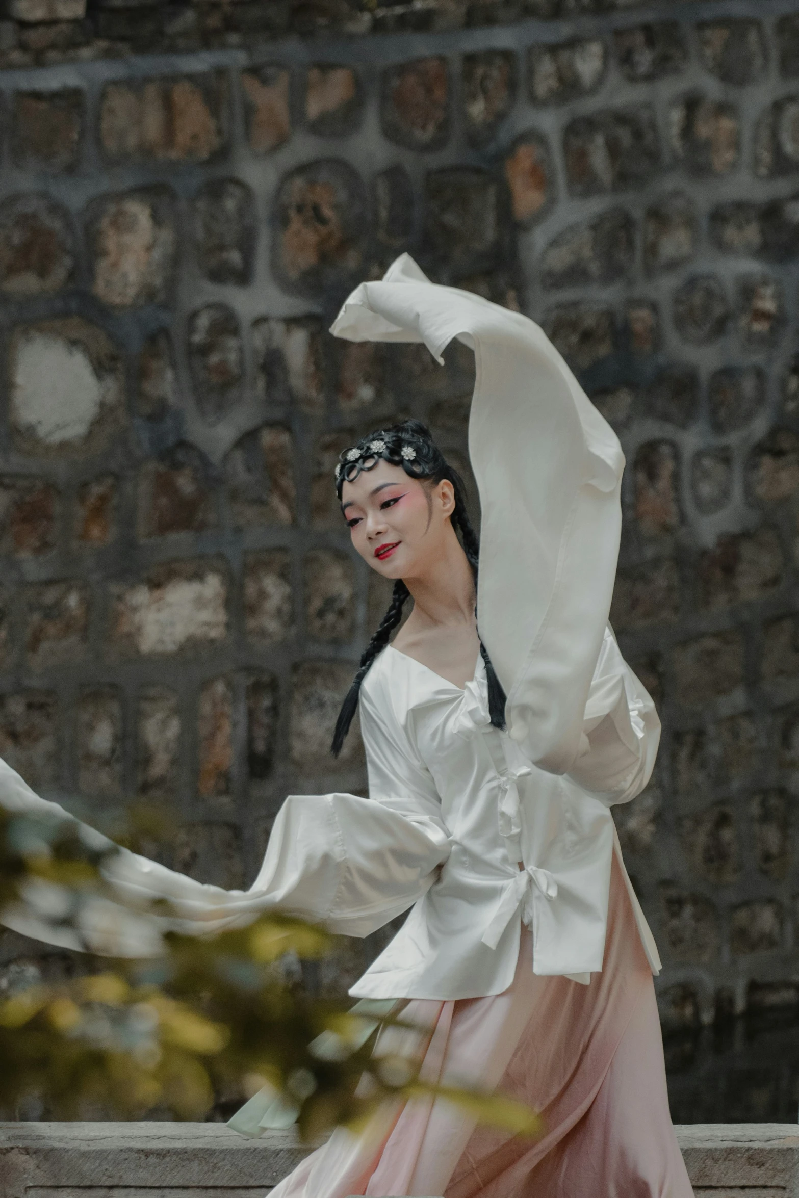 an oriental woman walks down the street