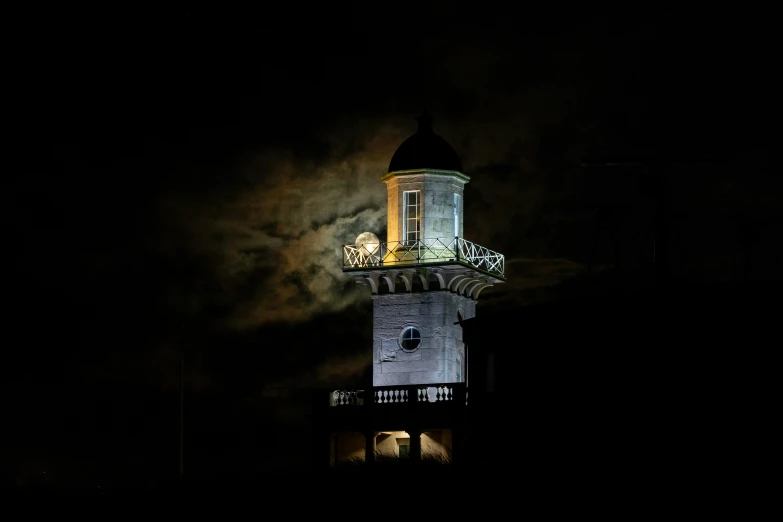 a night time view of an illuminated building