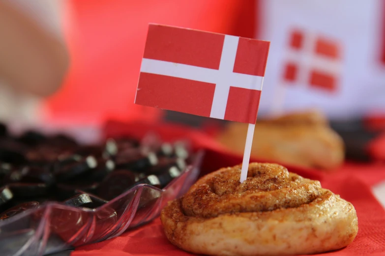 a small flag sticking from top of a pastry