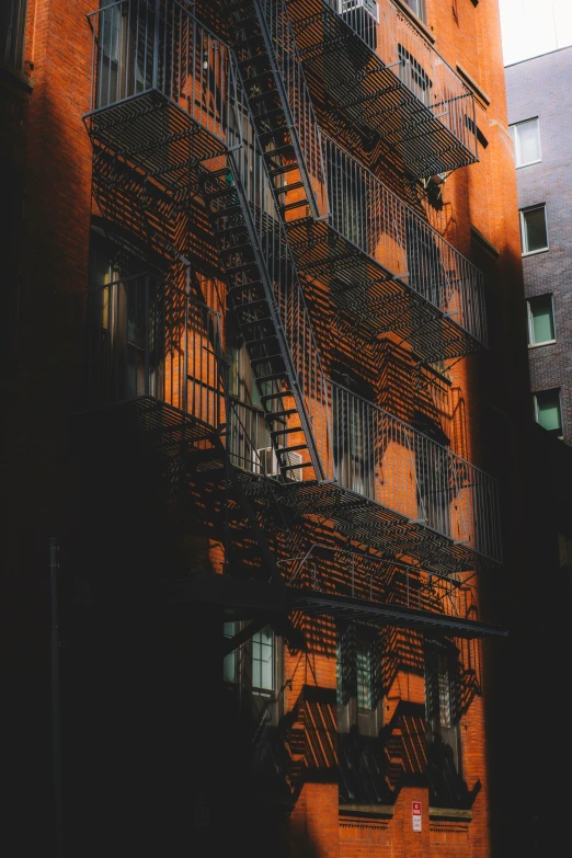 fire escapes on the side of an old building