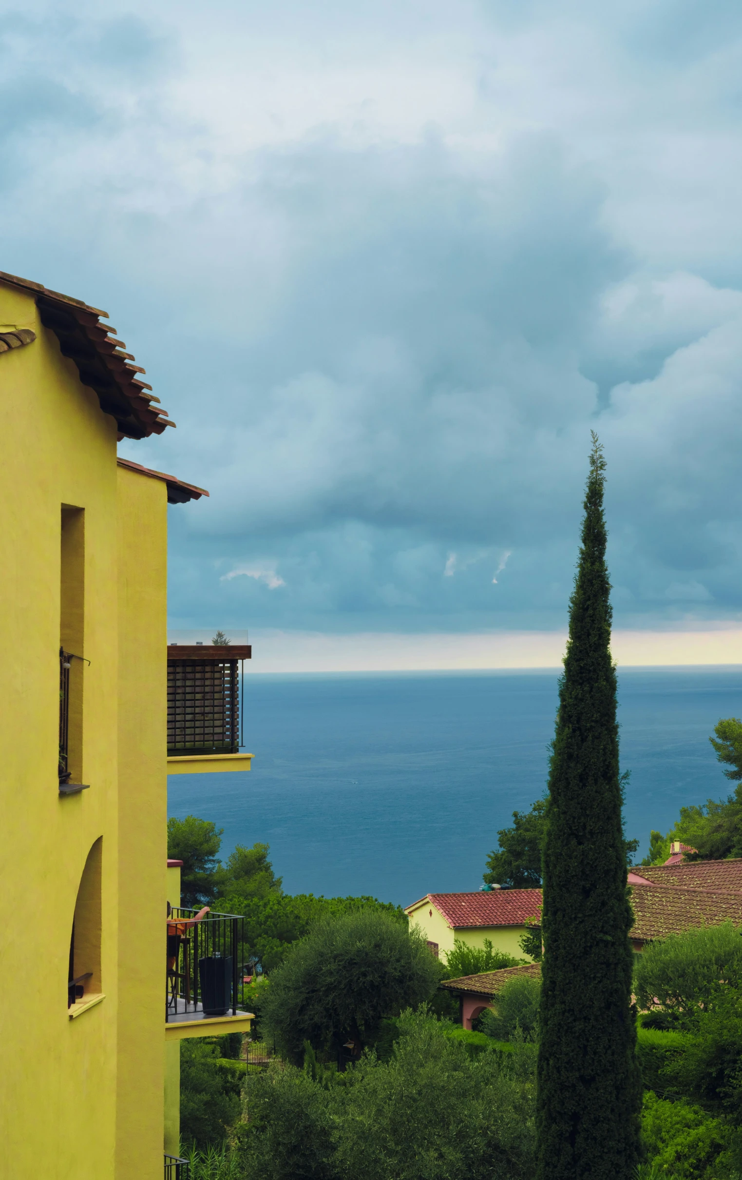 a view over the ocean and an apartment building