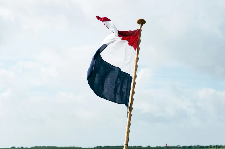 a flag that is on the side of a road