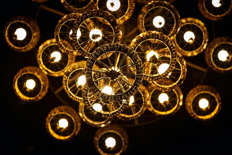 a lighted chandelier hanging from the ceiling