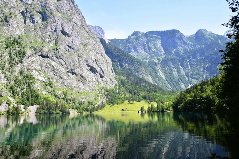 mountain side view with clear water on clear day