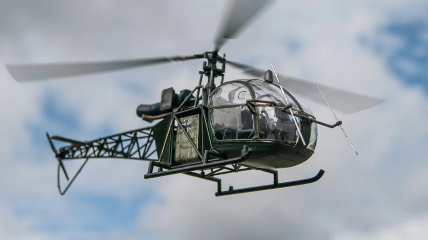 a large helicopter that is flying in the air