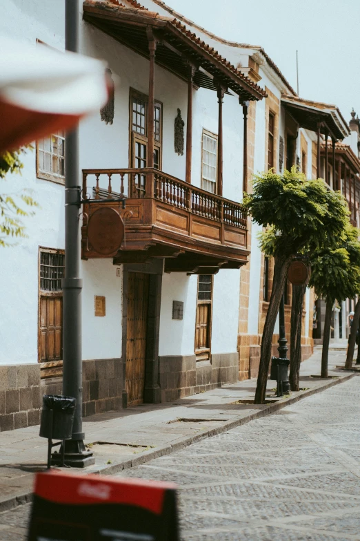 a row of buildings that are next to a street