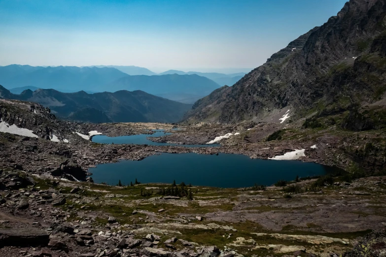 a mountain view with some water in it