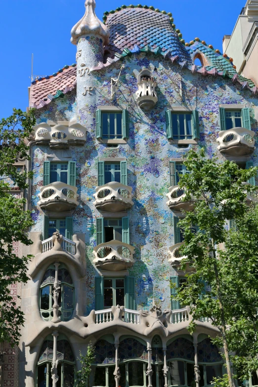 a building in the shape of a cat on its head