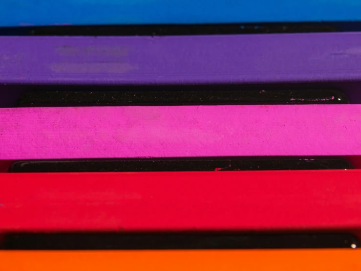 the po shows a close up of four different colored items