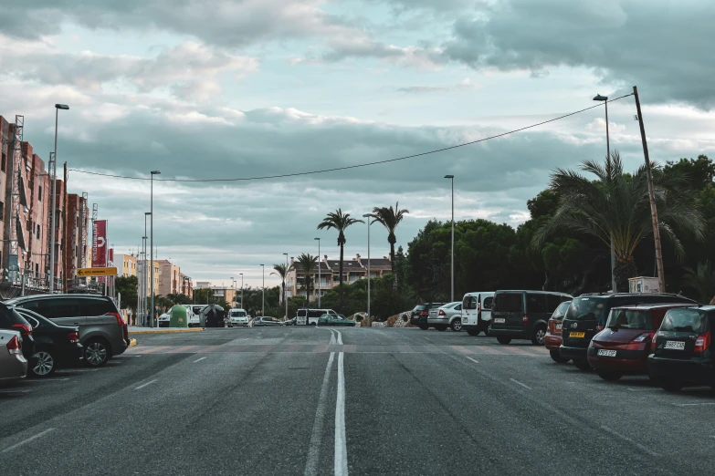 there are many cars on the road driving in different directions