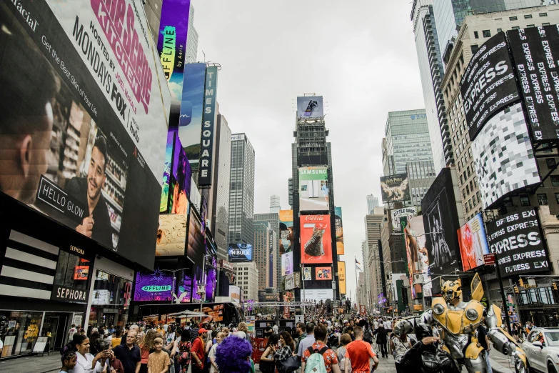 people are walking in the street during the day