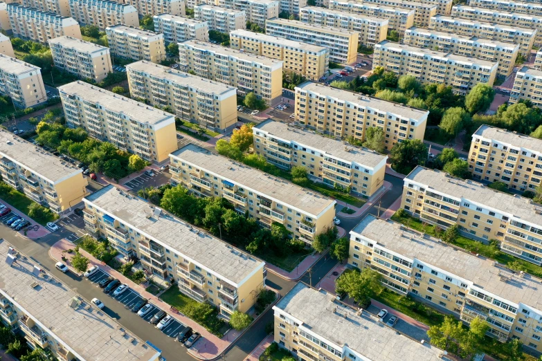 an aerial view of a street full of buildings