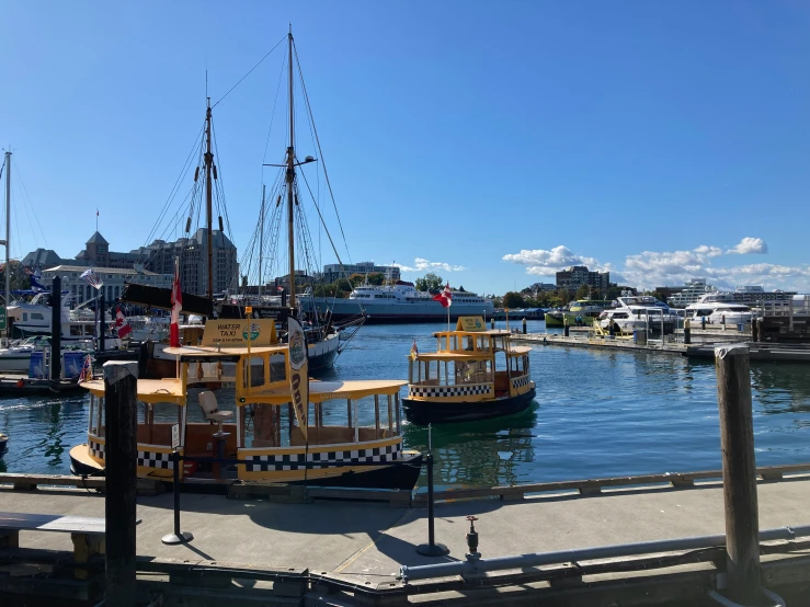 there are several boat in the water at the dock