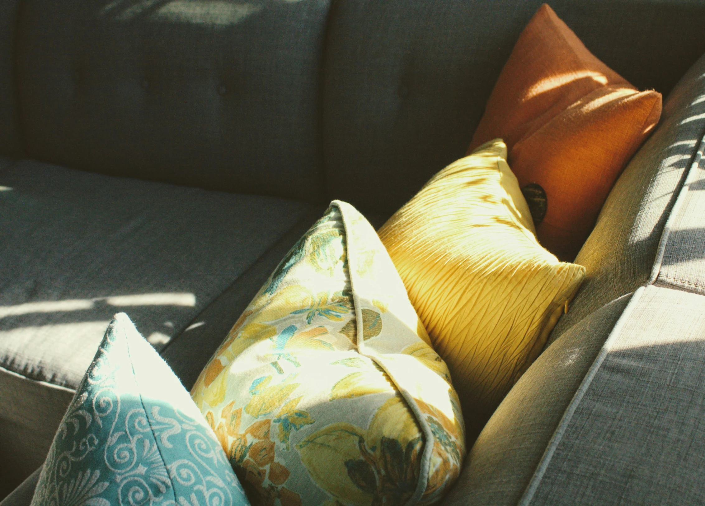 cushions arranged on the back of a couch