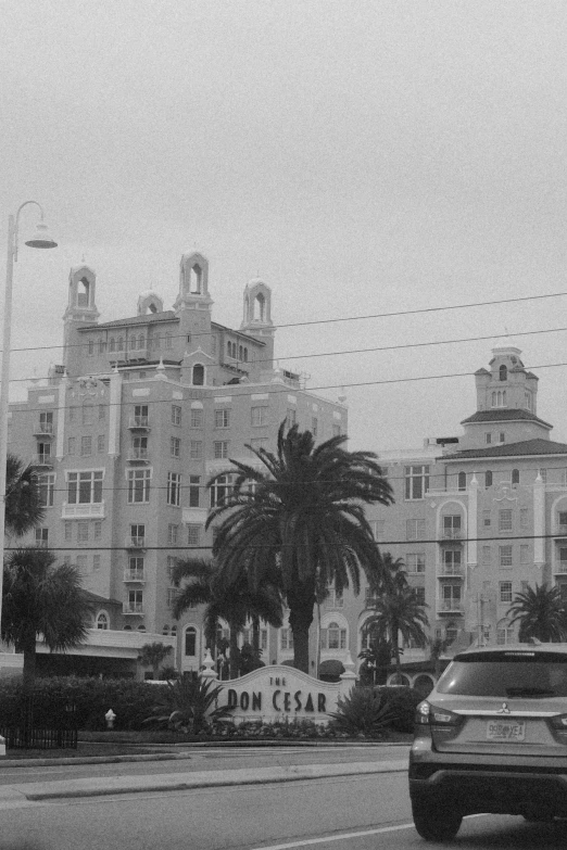 a black and white po of a city with cars