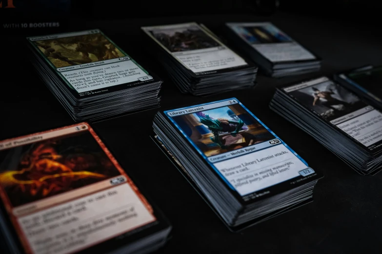 a group of cards with black edges are shown