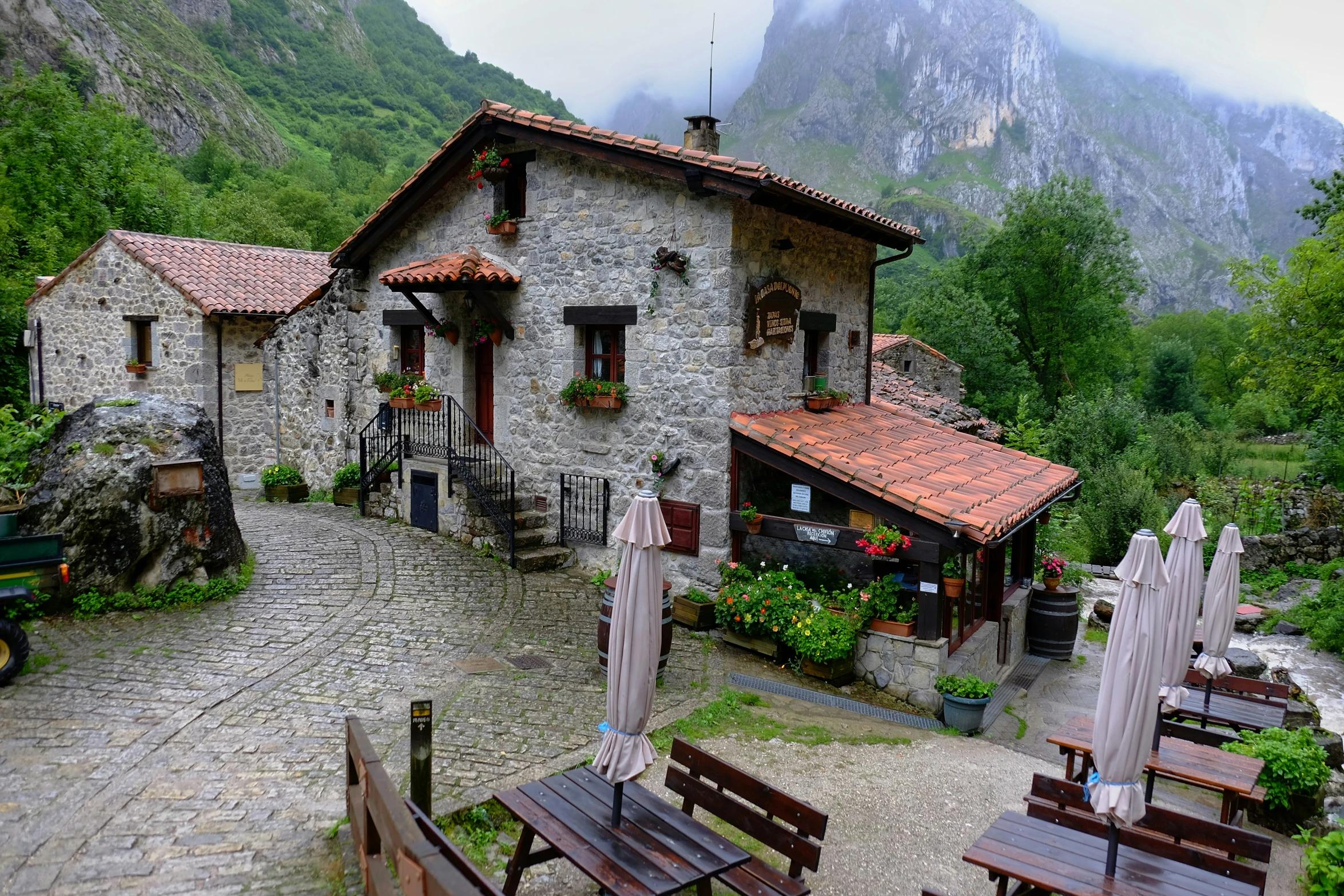 this house sits near the foot of a mountain