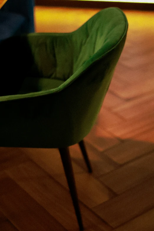 a closeup view of a chair and the floor