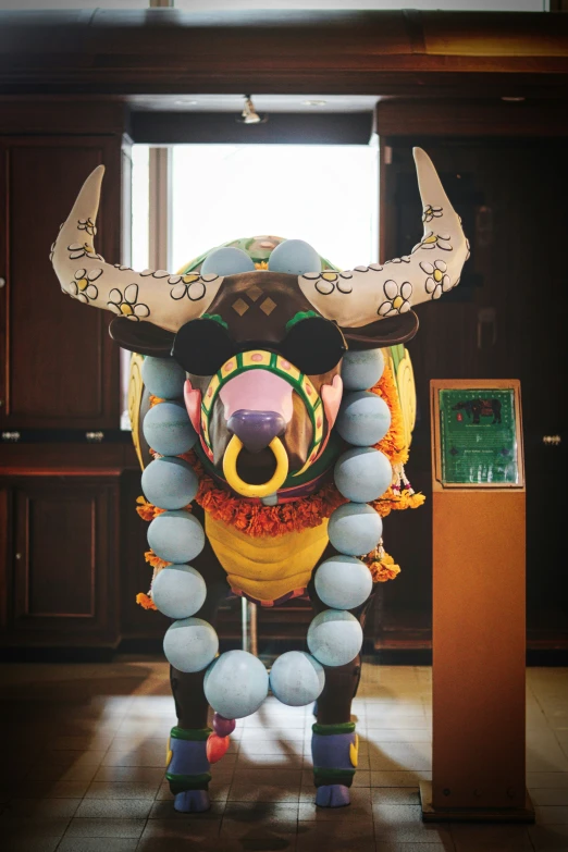 this is a large decorated sculpture in the shape of an ox