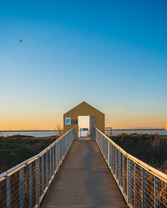 this is a picture of a boardwalk in the beach