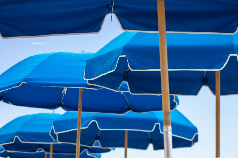 an array of umbrellas with different shapes and colors