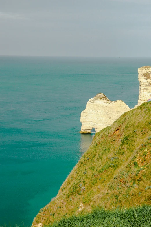 the rocks are near a large body of water