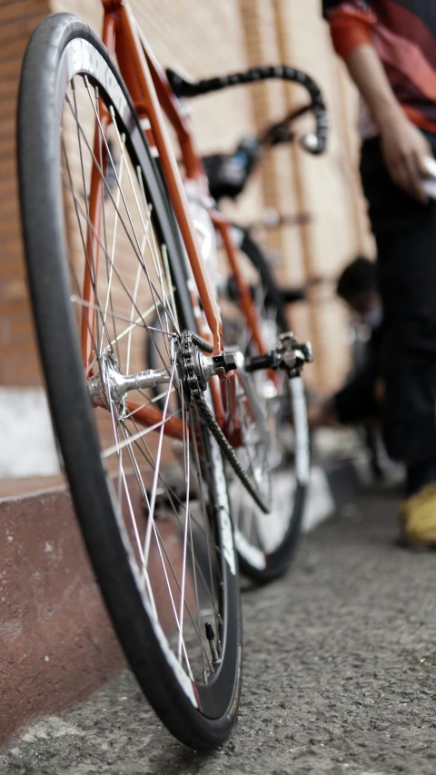 there is a close up po of a bicycle wheel