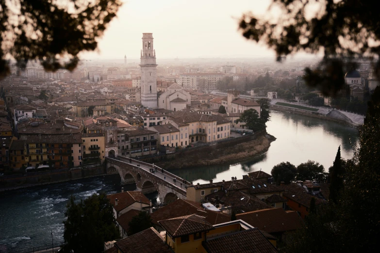 an image of old town with a bridge going over it