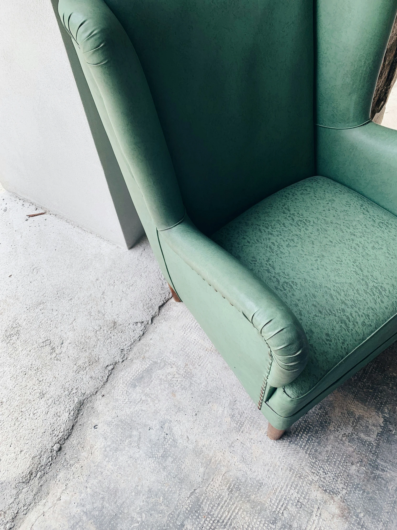 the corner of an office building with a chair