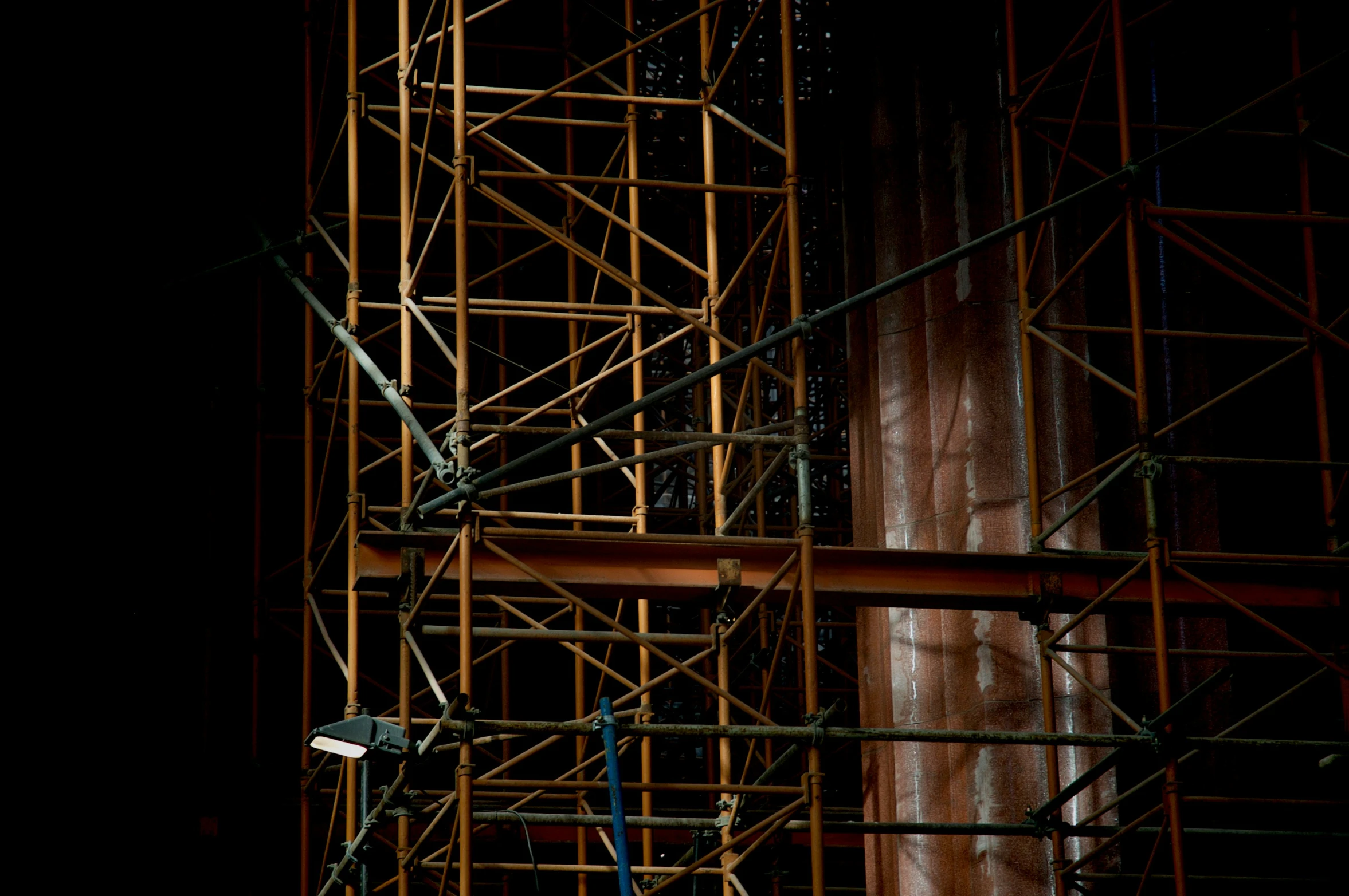 a close up of a structure with scaffolding on it