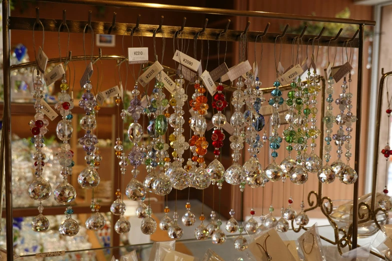 a rack of earrings and celets in a store