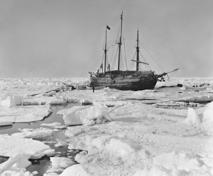 a ship is in the ocean on ice