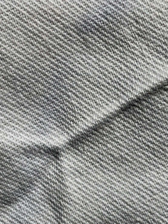 a textured background image of white cloth