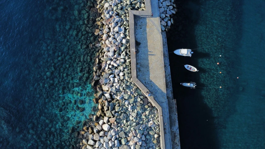 a view from a bird's eye view of boats in the water