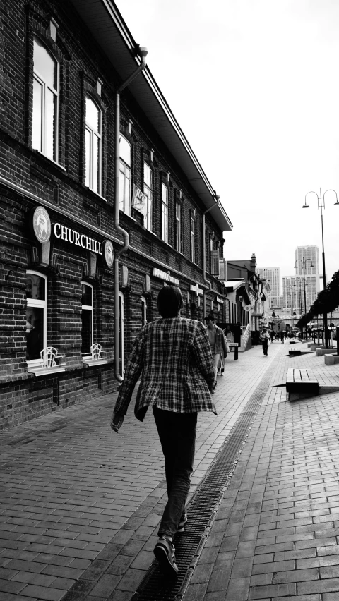 a person with a skateboard on a city street