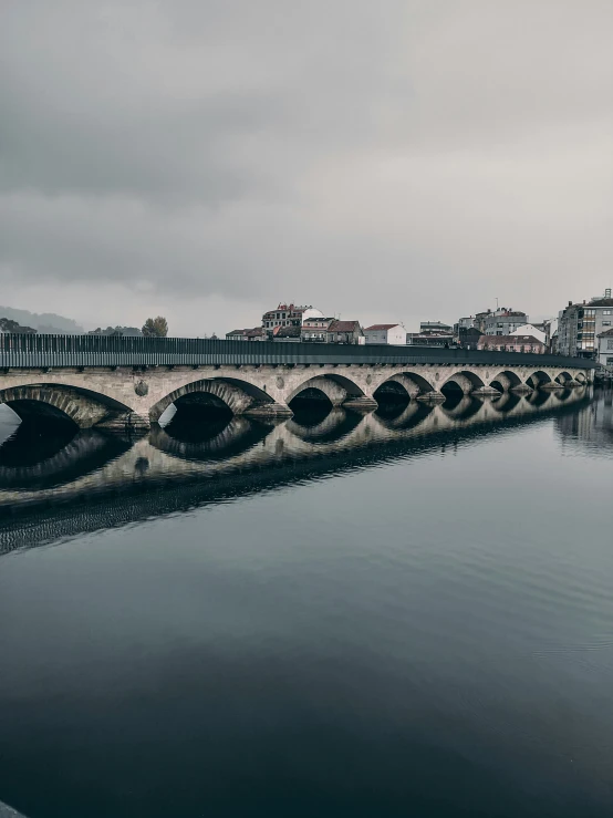 a bridge that is going across a river