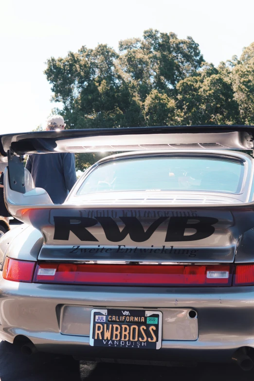 the back end of a car with a rwd logo on it
