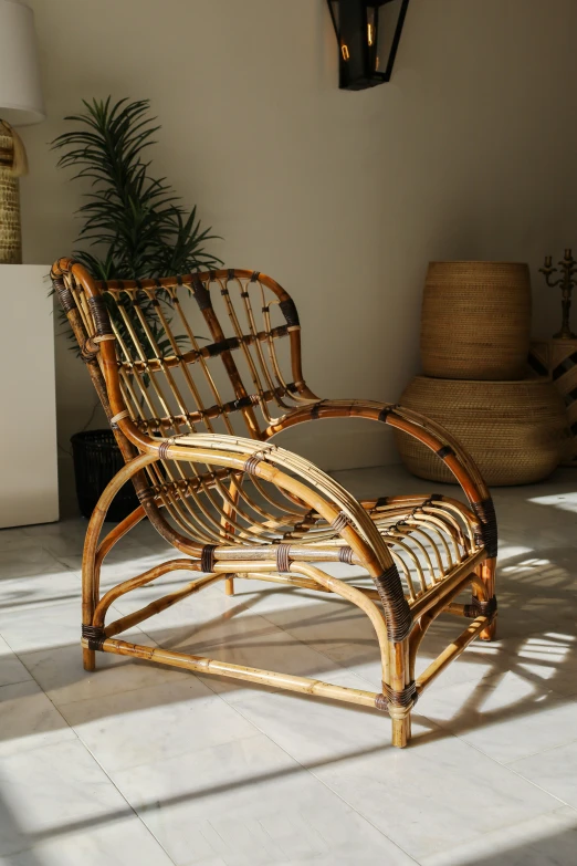 a woven chair is sitting in a room