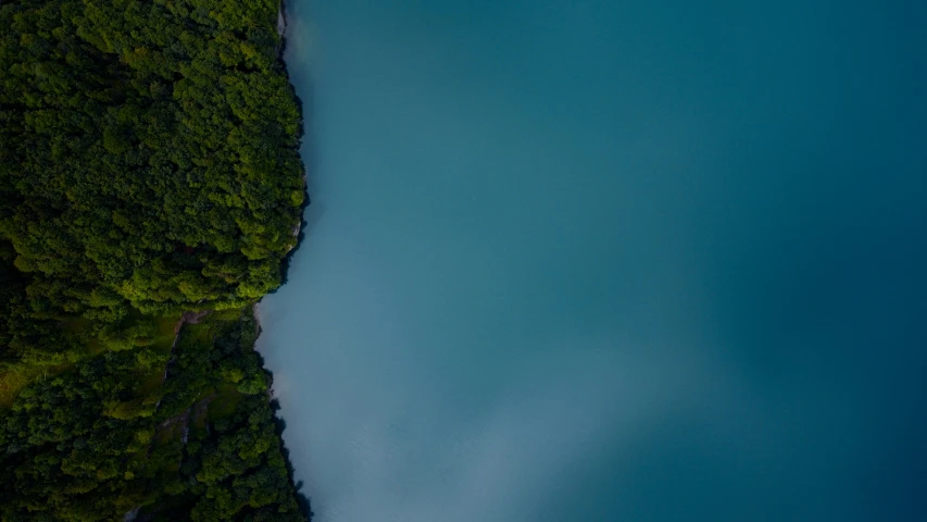 a boat is out in a blue river