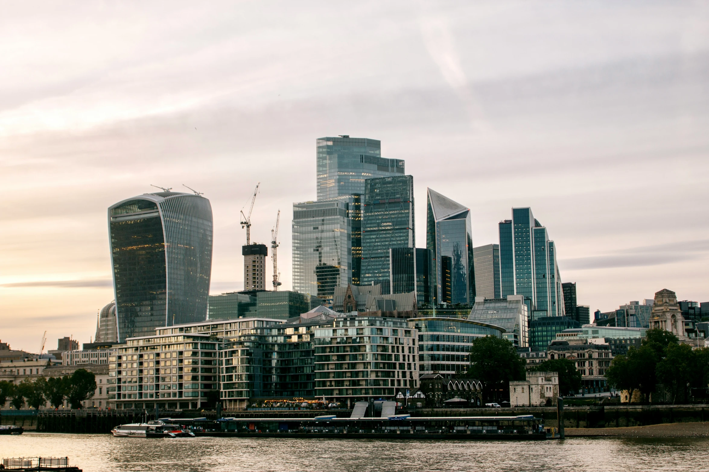 a view of the city skyline from across the river