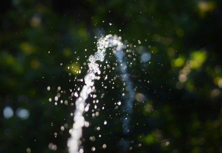 water shooting up from top of a pipe