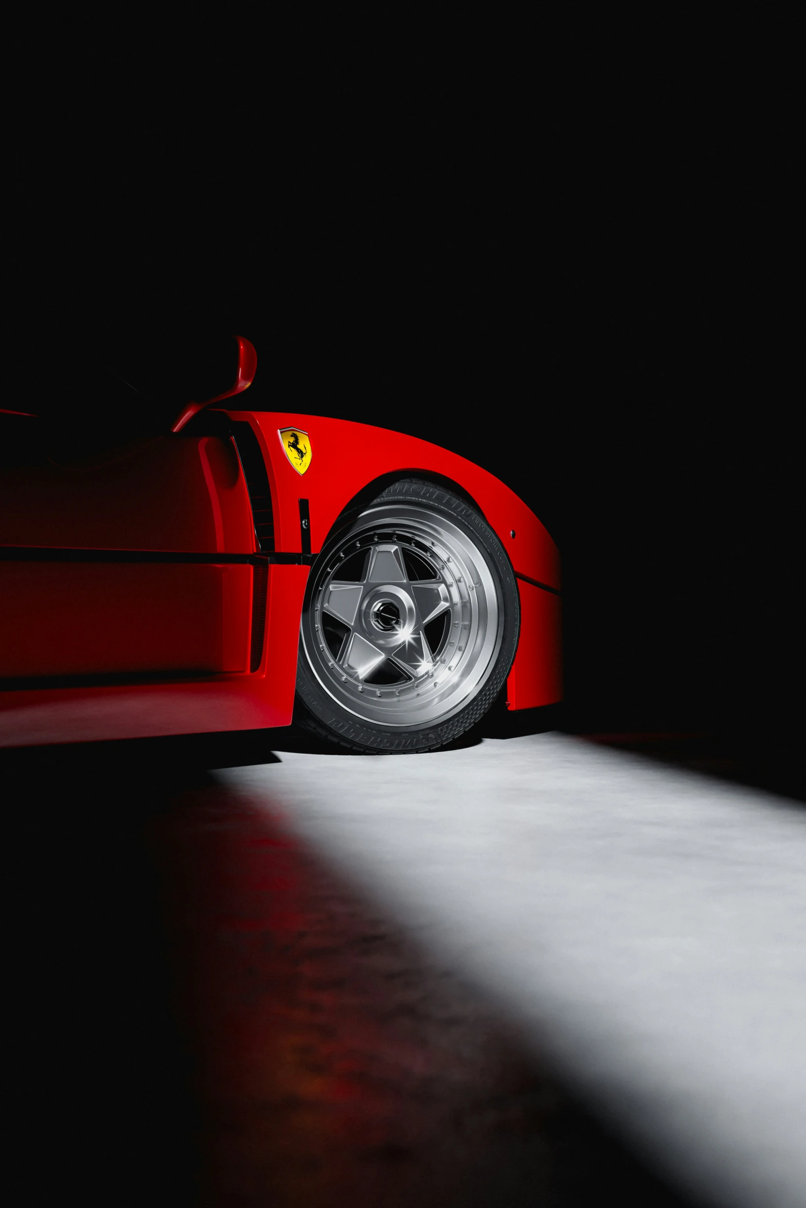 red sports car on white floor with flash of light from the background