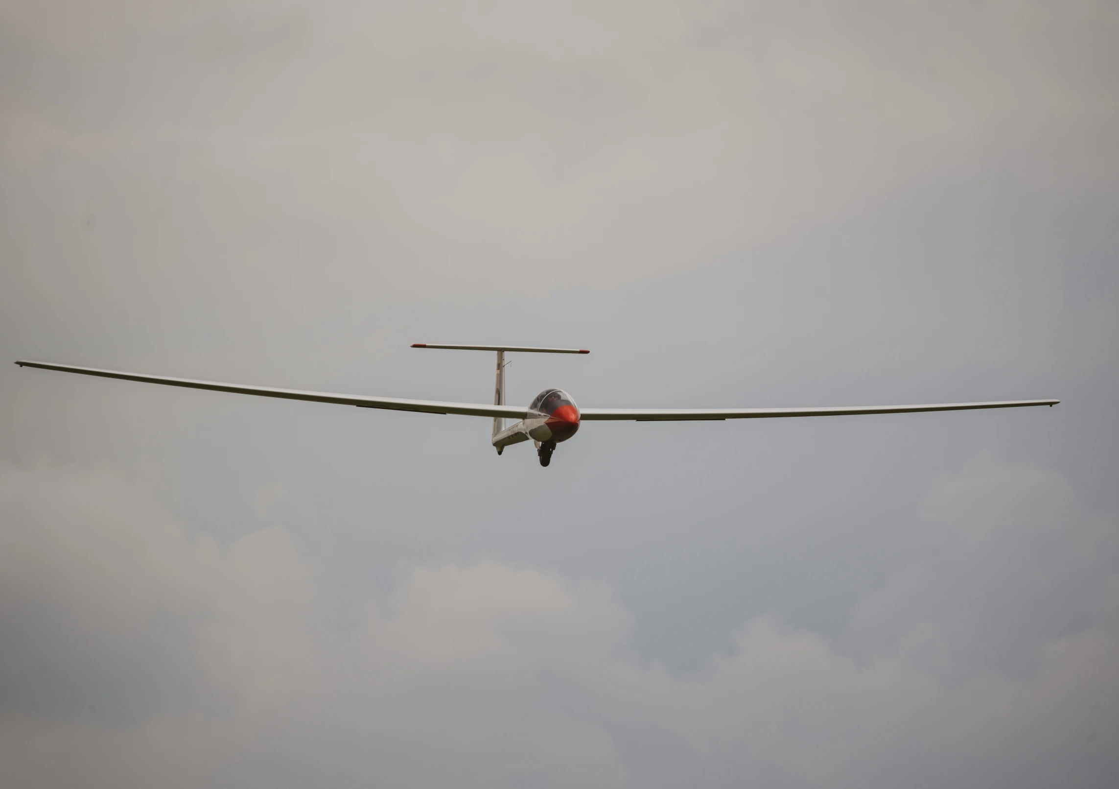 two large propeller planes flying in the sky