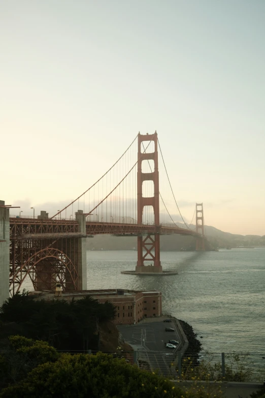 the golden gate bridge is visible from across the bay