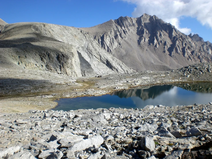 there is a blue lake in the mountain