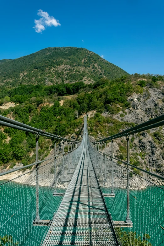 a long suspension over the water on a rope