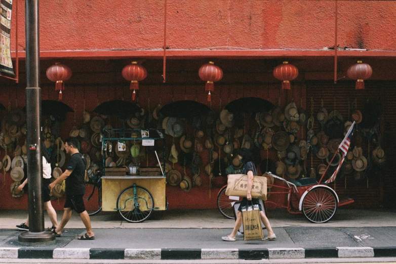 the street is lined with different shoppers on bikes and other things